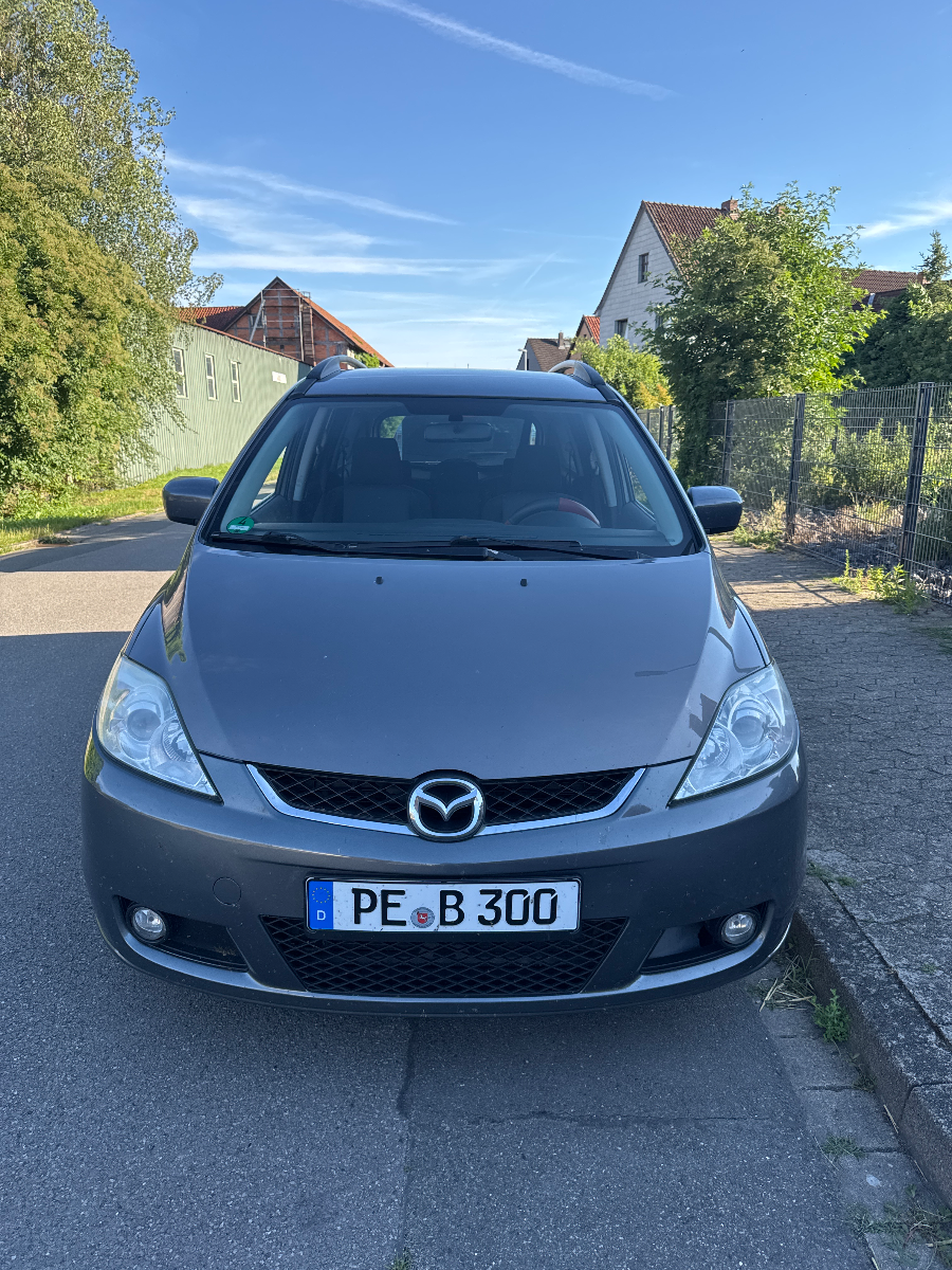 Mazda с багажными рейлингами